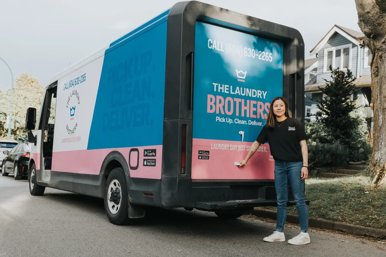 A Laundry Brothers branded delivery truck on its commercial route through a Greater Vancouver neighbourhood.